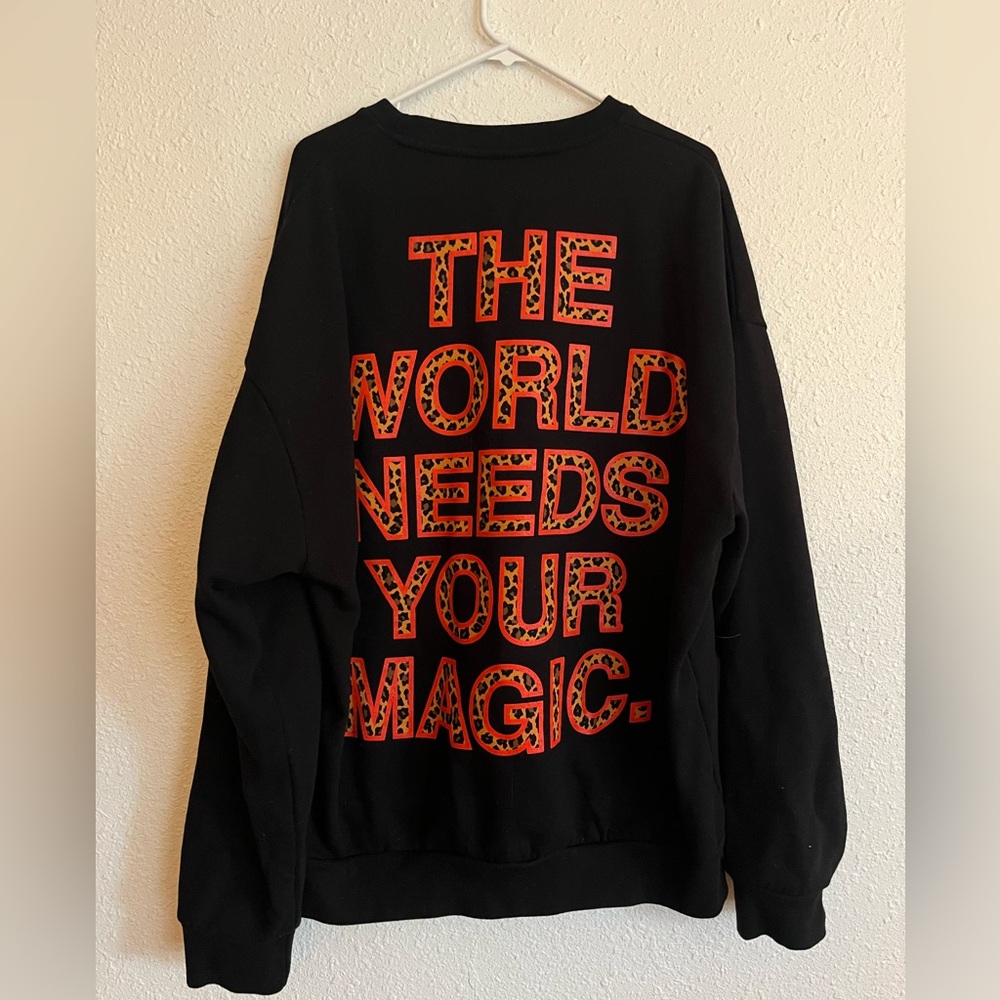 Dressed In Lala the world needs your magic Crewneck
